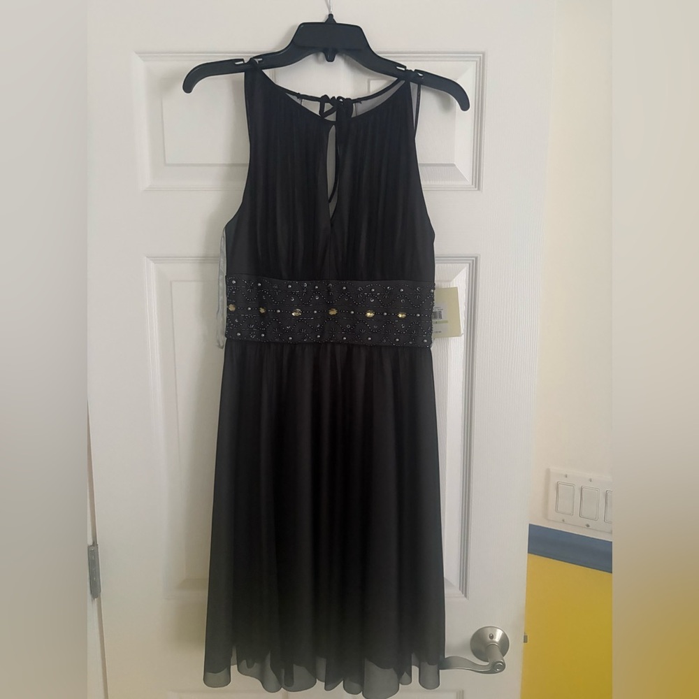 NWT Elegant Black Sleeveless Dress size 4